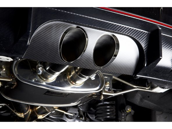 Once the hangers and pipes are tight, tighten the exhaust tips in alignment of the panel.