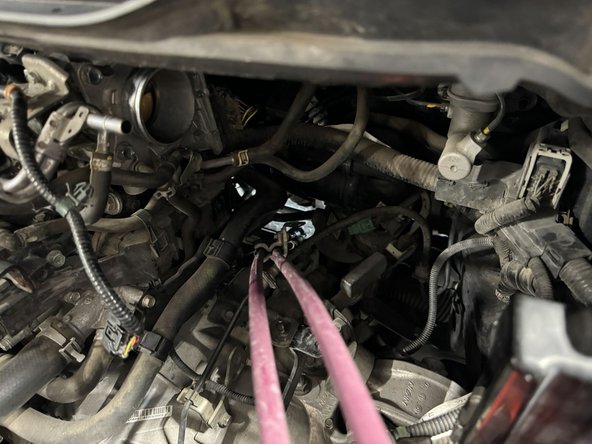 After cables are free interior, pull them out through top of engine bay.