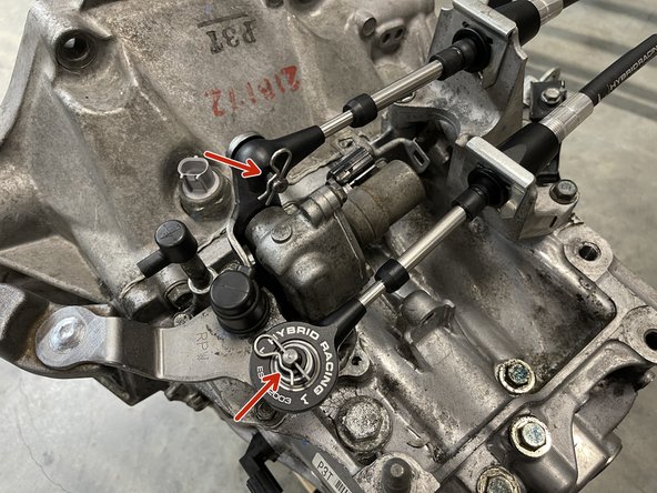 Install the supplied cotter pins in both cable end links.