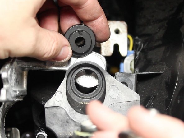 Install the aluminum base bushing using the supplied hardware.