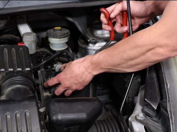 Remove the battery tray and set it aside.