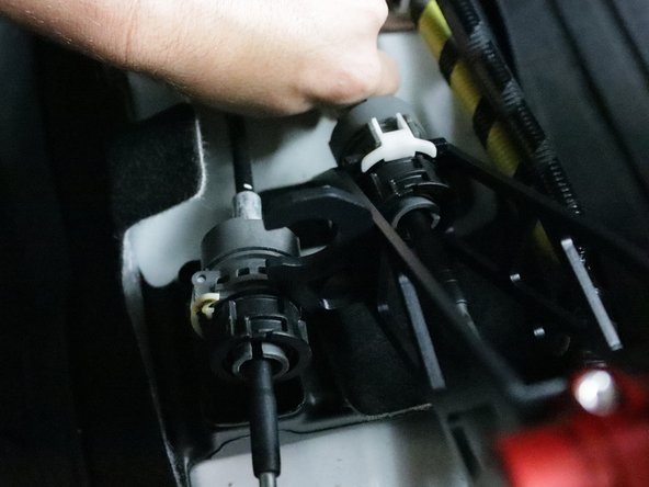 Refer to step 13 &amp; 14 and re-install the shifter cables onto the Hybrid Racing shifter.