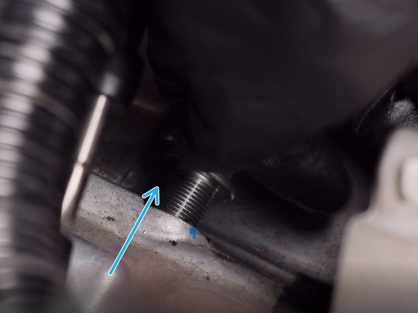 Locate the side detent spring and remove it.