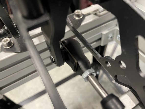 Use a spring C clip to hold the cable to the shifter.