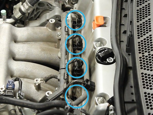 Disconnect all of the fuel injectors.