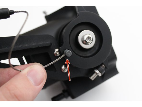 Insert the cable end into the throttle body rotor.