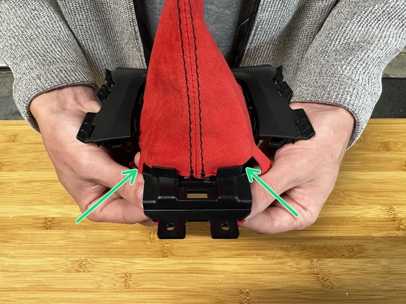 Make sure the fabric covers all corners before installing the silver trim ring.