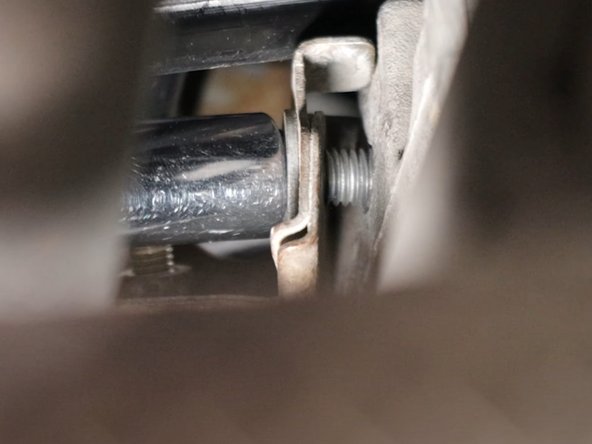 Reinstall the shifter cable bracket last, making sure that the cables are oriented the correct way.