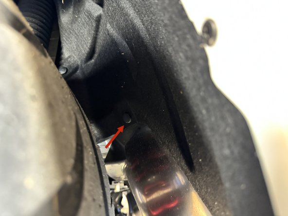 There are clips in the wheel wells as well as bolts on the inside section near the muffler. Remove all.