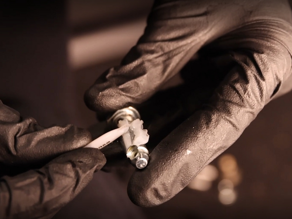 Use the tube of supplied grease and apply it to the clevis pin.