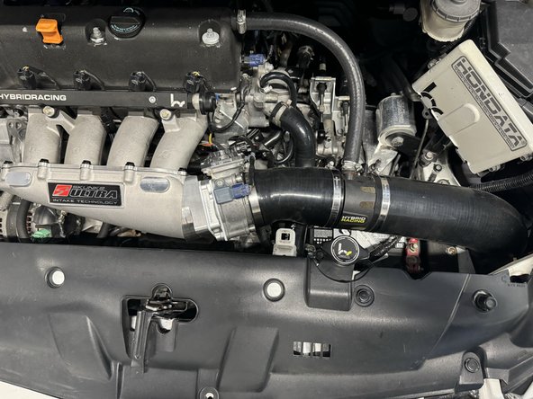 After installing throttle body, connect sensors and electronics on throttle body. Proceed to installing your air intake of choice.