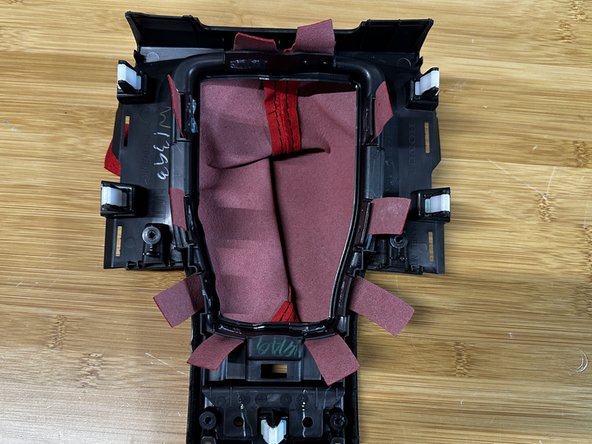 Install silver trim working from front to back of the bezel.