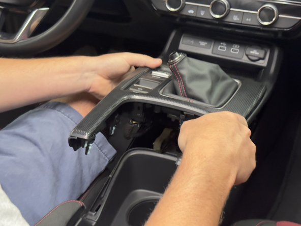 There are no bolts or screws. Pull up gently and the cover will unclip.