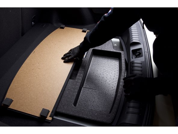 Begin installing the electronic valve controller by lifting and removing the factory FK8 rear foam tray.