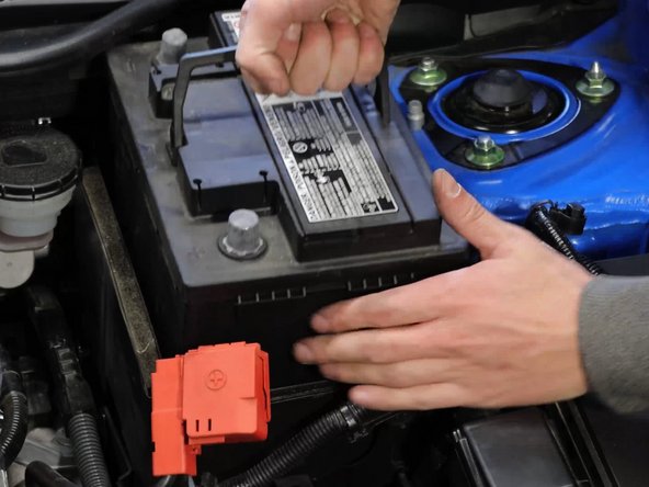 Remove the battery, protective padding, and then plastic undertray.