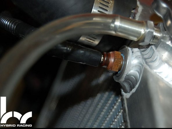 Connect the coolant temperature sensor in the bung at the top of the radiator. (connect to your conversion harness)
