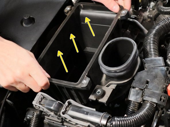 Pull the airbox up and remove it from the engine bay.