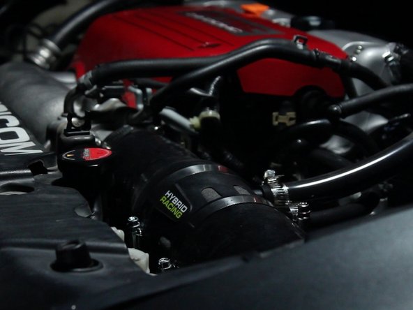 Re-install the body parts and fill the system with coolant!