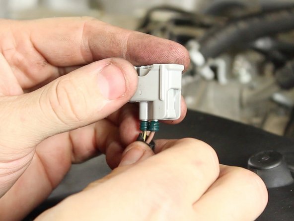 Be sure the yellow wire with the black line is on the opposite side of the clipping mechanism as shown in the pictures.