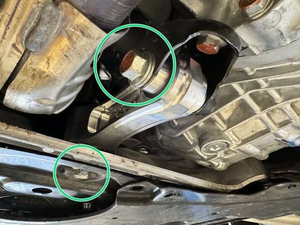 Thread both bolts in by hand, then torque them down.