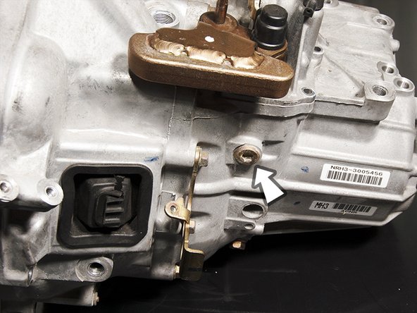 Remove the interlock bolt using a 7mm allen wrench.