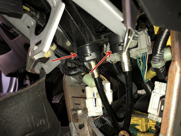 Remove the shifter cables from the shifter assembly.