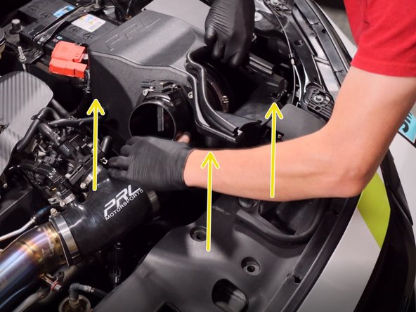 Pull the coupler off and remove the airbox from the car.