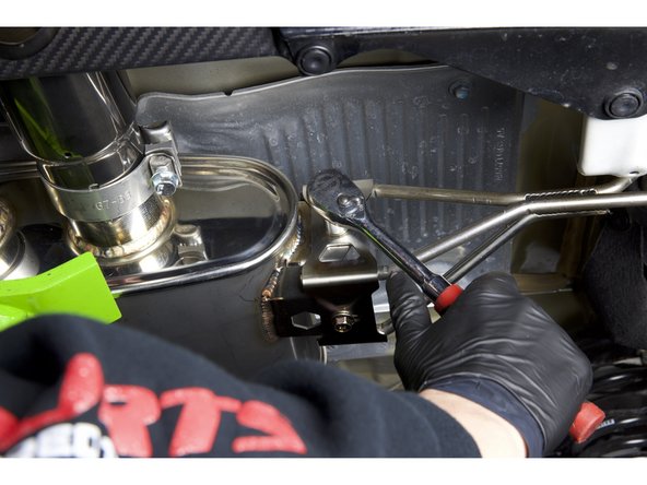 Once everything is aligned, tighten the rear muffler hangers and the remaining pipe connections.