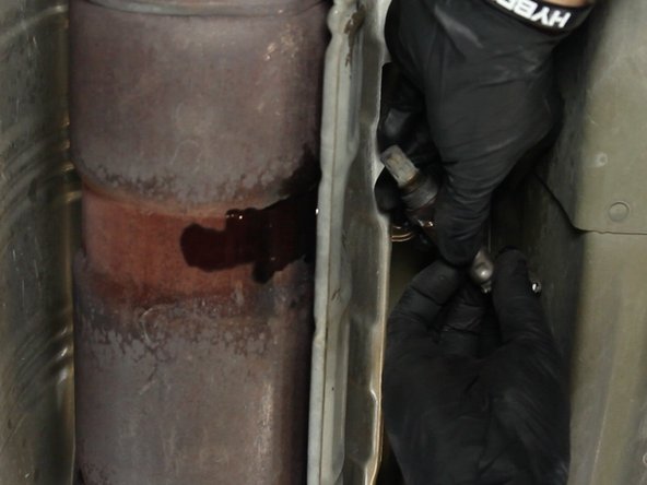Using an crescent wrench or an o2 sensor socket, remove the o2 sensor from the catalytic converter.