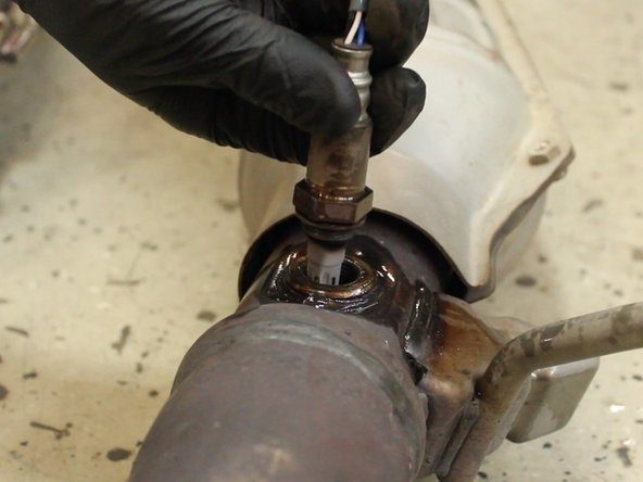 Remove the primary o2 sensor from the catalytic converter pipe.