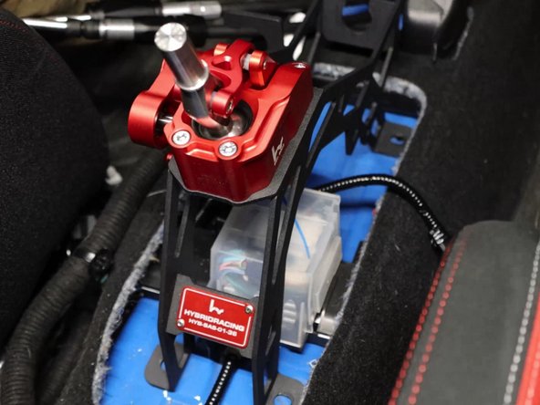 Back inside of the car, you can now install the shifter.