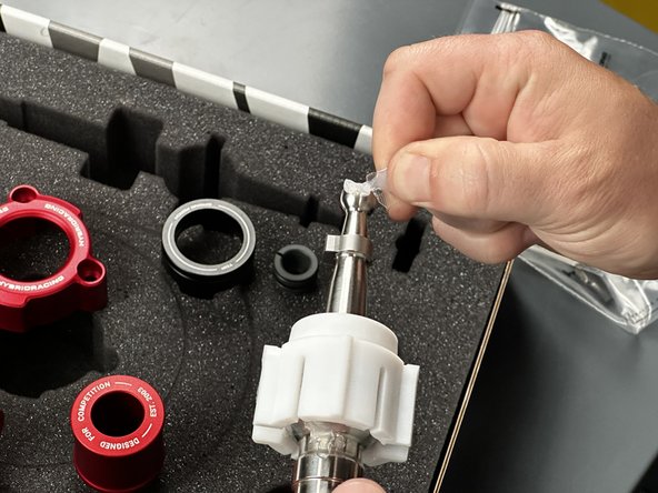 Open another packet of grease on the Shifter Main Rod and apply it to the end ball.