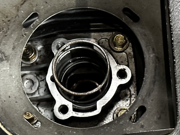 Re-install the OEM shifter spring.