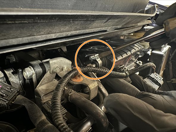 Tighten throttle body clamp