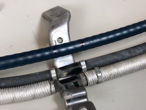 The Hybrid Racing shifter cables require the use of the factory brackets and seal.