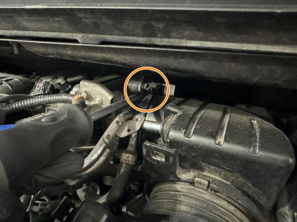Using 5.5mm Socket or Philips Driver, loosen Throttle-Body clamp.