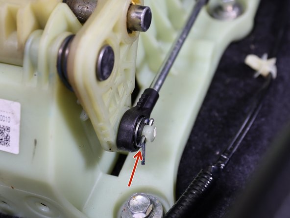 Remove the shifter cable cotter pin and slide the shifter cable off.