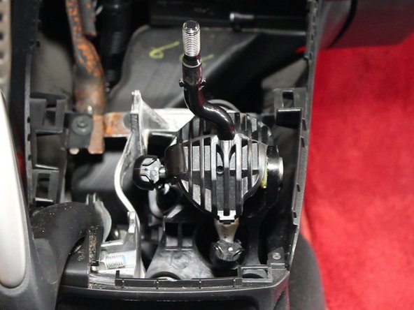 Remove the two mounting screws.