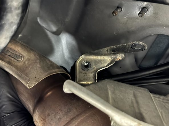 Slide cable bracket from OE cables onto Hybrid Racing Cables.