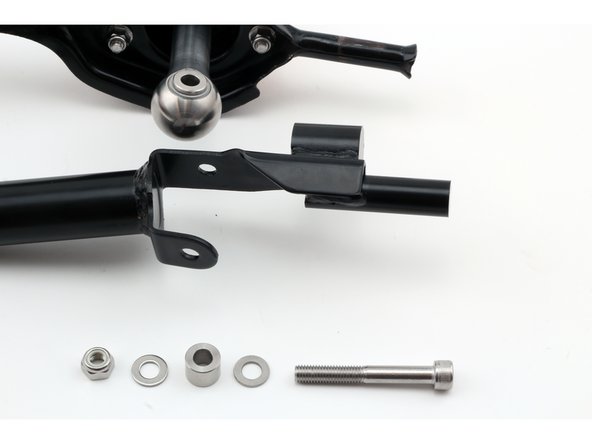 Use the supplied hardware listed in Step 1 and connect the shifter to the linkage. Be sure to use both flat washers, spacer and longer 60mm bolt.