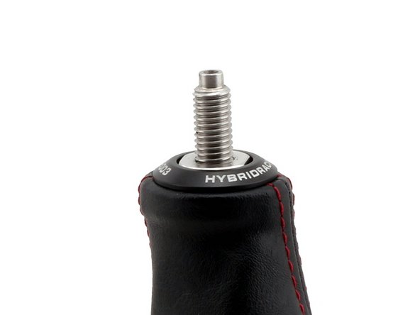 Once you have your shift knob threaded on, use a wrench to tighten the stainless steel sleeve against the knob, locking it into place.