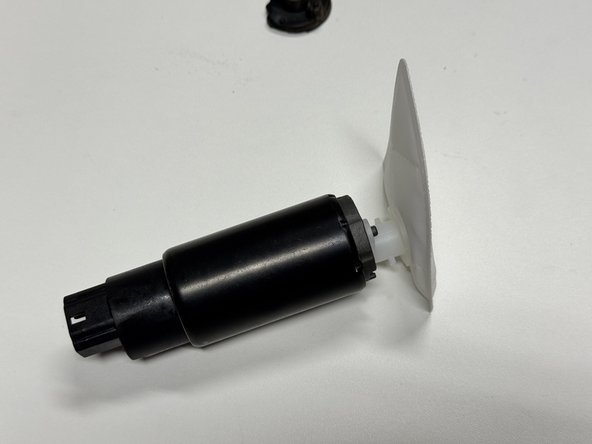 Use the supplied filter and retaining clip.