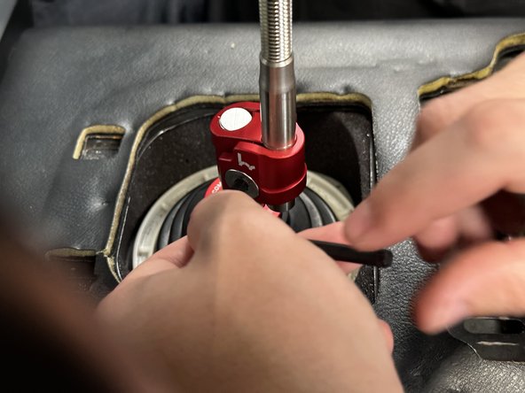 This part can rotate 360* and raise the shift knob. Try a few different positions to dial in what feels best.