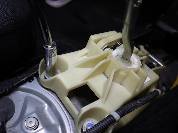 Remove the Left Rear shifter bolt.