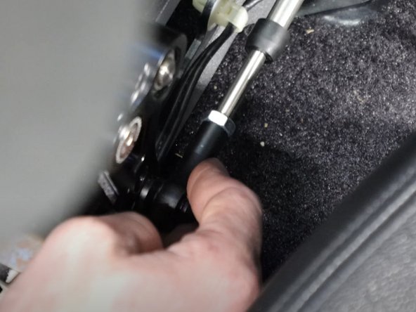 Install the cable end link to the shifter using the supplied retaining clip.