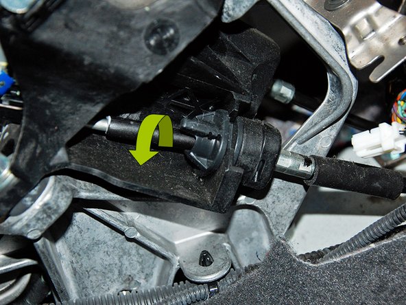 Second, you need to the remove the two bushings located at the base of the shifter by rotating them counter-clockwise and sliding out the side as shown in the next 2 images.