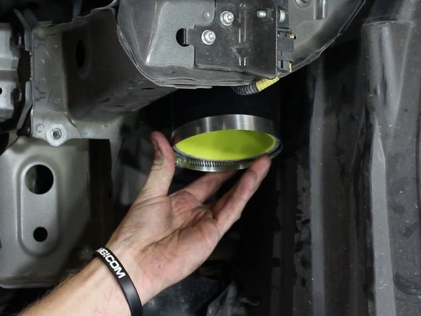 Using the supplied hose clamps, install the air intake velocity stack and filter.