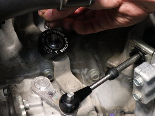 Secure the shifter cable end links with the supplier cotter pins.