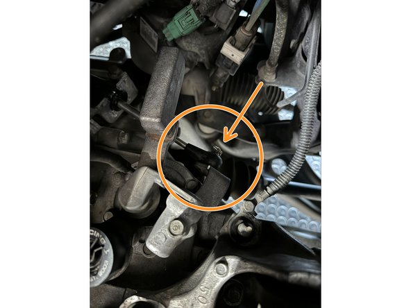 This is the Front-Back cable. It transmits the Front-Back action of the shifter to the transmission.