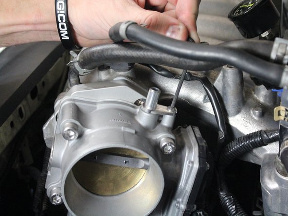 Used the supplied bolt to tighten down the bracket for the vacuum fitting.